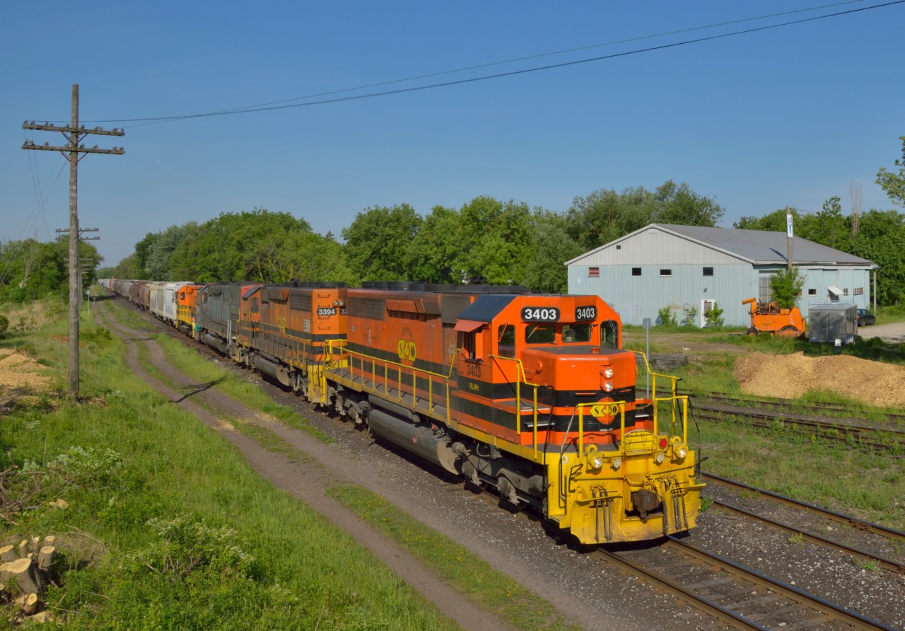 Bound for Mac Yard GEXR 432 heads east with SD's and a GP35 up front.  This afternoon GEXR 431 returned without 2500, which was left at Mac Yard, likely headed to another G&W operation.  Recent Metrolinx brush cutting operations can be seen here, with new vantage points opened up.