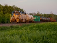 After spraying down the Hamilton Subdivision and making a quick turnaround, D&H 7303 hustles northbound towards Guelph Junction under the last, last rays of sun. 