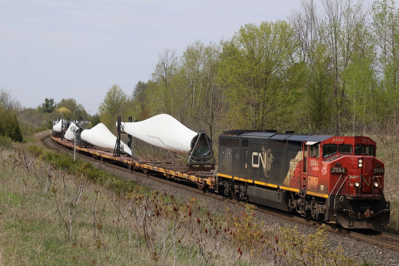 CN Dash-8 #2444 has a train load of blades from Quebec in tow as it coasts through mile 30 at Scotch Block.