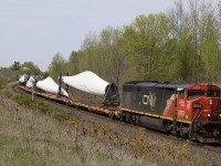 CN Dash-8 #2444 has a train load of blades from Quebec in tow as it coasts through mile 30 at Scotch Block.