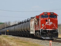 CP 8134, a brand-new AC44CWM rebuild, helps push this tank train into Winnipeg on the CP Emerson Subdivision. These locomotives sure look good with the new beaver on them.