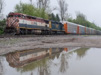CN E271 grinds up the grade at Copetown with BCOL 4607, CSXT 8878 and 110 autoracks.  