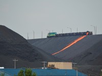 Vale Mining's GP38M-4 #2004 empties the last of it's 5 bottle cars before running back into the Vale yard below, an operation rarely seen/photographed anymore, we were very happy to purely stumble across this on our way out of Sudbury! 