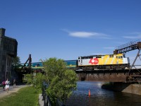 Wrapped VIA 6436 leads VIA 37 over the Lachine Canal.