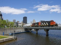 The Pointe St-Charles switcher is leaving the Port of Montreal with twenty cars and CN 4135 & CN 7226 for power.