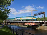 VIA 915 leads VIA 33 from Quebec City over the Lachine Canal a bit south of downtown Montreal.