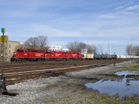 CP F94 with CP 2252, CP 4428 & CP 3024 is passing the north end of the Lasalle Yard with cars for clients on the Lacolle Sub.