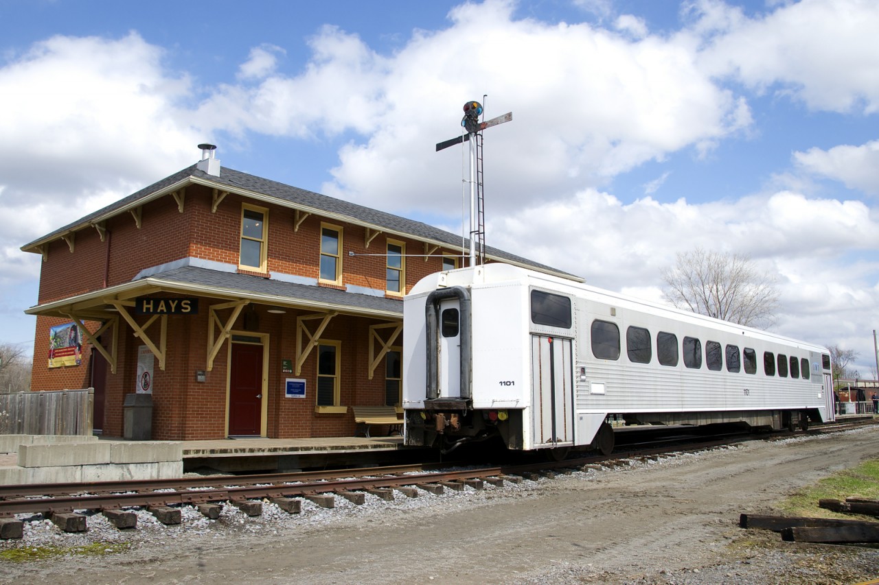 Ex-GO Transit car AMT 1101 is parked in front of Hays Station at Exporail.