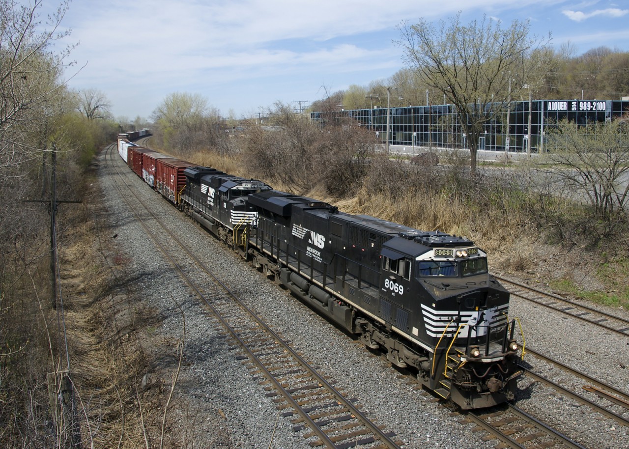 Norfolk Southern (along with CN) was a late convert to AC power. Whereas most Class I's were buying AC power starting during the mid-1990's, NS only bought their first AC units in 2011 with ES44AC and SD70ACe purchases. One of each is represented on CN 528 here, with ES44AC NS 8069 & SD70ACe NS 1131 powering the 55-car train eastbound on CN's Montreal Sub.