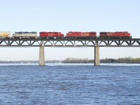 DH 7303 has been assigned to its home territory (on local CP D11 recently) for a number of years now, but is now supposed to be reassigned to Alyth yard in Calgary. Here it is trailing on CP 253 for possibly the last time; normally it comes up to Montreal Saturday morning for servicing and goes back south on Sunday. Ahead are CP 8627, CP 8112 & CP 3037 as the train crosses the St. Lawrence River towards the island of Montreal.