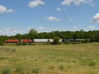 OSRX 8235 and OSRX 1591 (both former CP) trundle North towards Guelph with 11 cars plus former CP van OSRX 434462 in tow. 