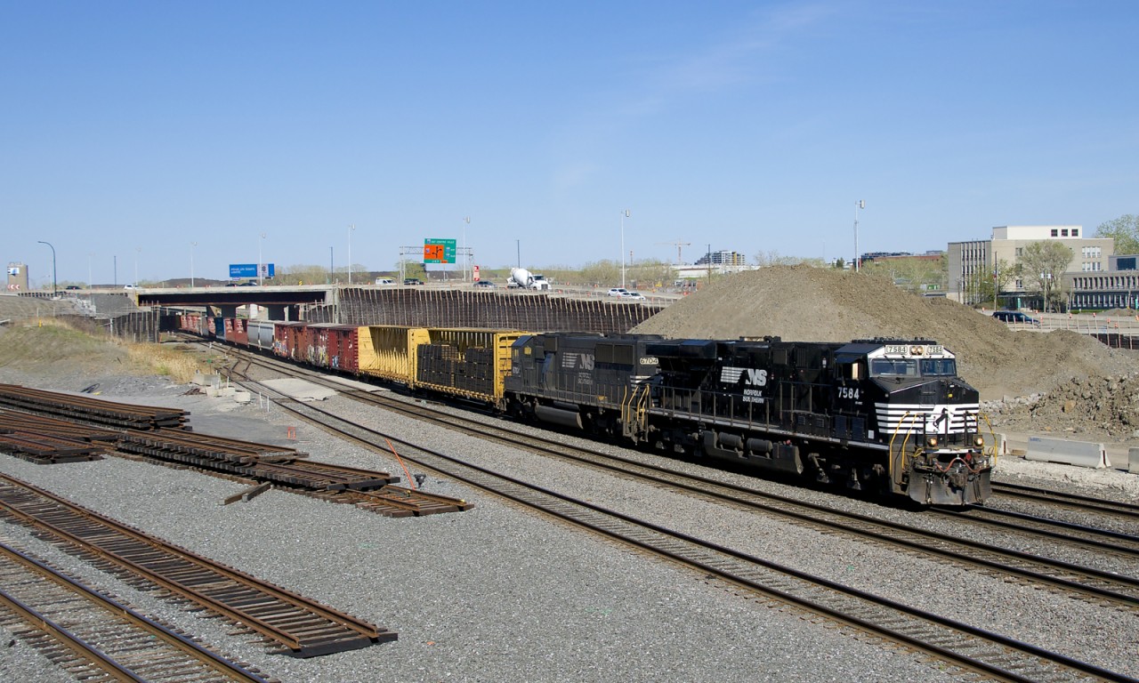 CN 529 has NS 7584 & NS 6704 for power and 36 cars as it passes Turcot West. At left is where CN's main line will move before the end of the year due to infrastructure work in the area.