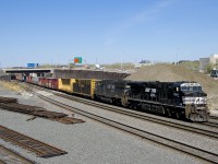 CN 529 has NS 7584 & NS 6704 for power and 36 cars as it passes Turcot West. At left is where CN's main line will move before the end of the year due to infrastructure work in the area.
