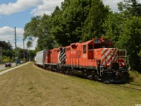 OSRX 8235 and 1591 cruise through Guelph btwn Cardigan Street and Joseph Wolfond Park en-route to work PDI plastics and Huntsman chemicals before returning South to the jct. 