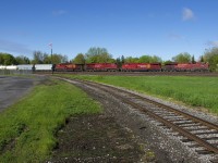 A 4-pack of GE's (CP 8835, CP 8112, CP 9357 & CP 8505) lead CP 253 past the Lasalle Yard and the southern leg of the wye leading to the Lasalle Loop Spur. It's nice to finally see some green out there.