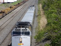 VIA 635 has wrapped F40 VIA 6416 leading and wrapped P42DC VIA 908 on the tail end as it makes its way towards its next stop at Dorval.