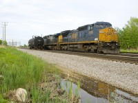 Dash8-40CW CSXT 7780 and AC4400CW CSXT 86 are both in CSXT's current paint scheme as they await the call to duty at Beauharnois. Both had been delivered to CSXT in the YN2 paint scheme, but were subsequently repainted. With CSXT retiring their Dash8's, shoot them while you can!