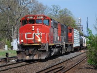 CN 435 slows to work the yard in Brantford with a good looking SD40-2W leading... good looking from the front at least.  CN's current power shortage has not only resulted in a lot of rent-a-wrecks; some old warriors are getting back out on the road also.  Thanks for the heads-up James.