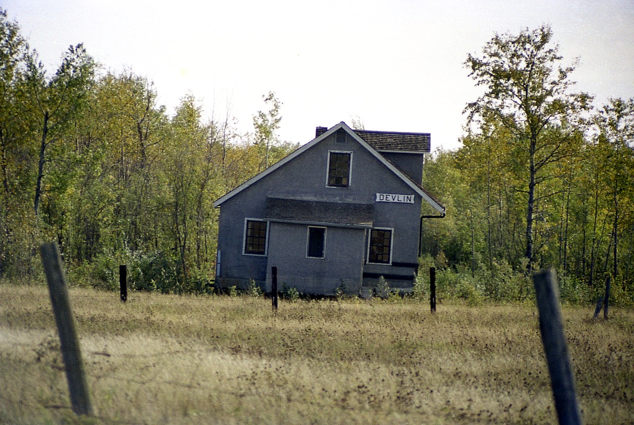 The old Devlin CN station as it looked in 1976. My recollection of the exact location of this building is hazy.I remember spotting it as I drove along Hwy 71/11. Obviously outliving its purpose, it appears to have been relocated to become a private residence. However, nothing happened. The station building sat in this location undisturbed for more than 20 years. I would assume now it has succumbed to the ravishes of time, and is no longer. For the heck of it, I checked the population on an Ontario map closest year to when I shot this photo,  and the population of Devlin in 1972 was only 63. Hard to imagine stations were once like post offices, in fact, they were in part, and they served a purpose everywhere.