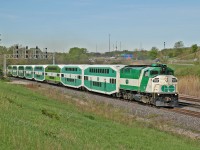 The Victoria Day long weekend marks the return of GO Service to Niagara Falls on the weekend.  Here we see train 984 racing through Snake with GO 560 leading a 8 car 'excursion' train, they will meet westbound counterpart 985 around the Aldershot GO Station.