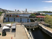 The Pointe St-Charles Switcher has CN 7726, CN 4135 and four cars to interchange to the Port of Montreal as it cools its heels, awaiting security to flag the crossings in this area.