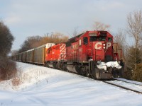 Wearing a slowing fading duel flags paint scheme, Canadian Pacific SD40-2 5662 leads a westbound train up the ironic Orrs Lake hill, west of Galt, Ontario on the railway’s namesake Galt Subdivision. 
