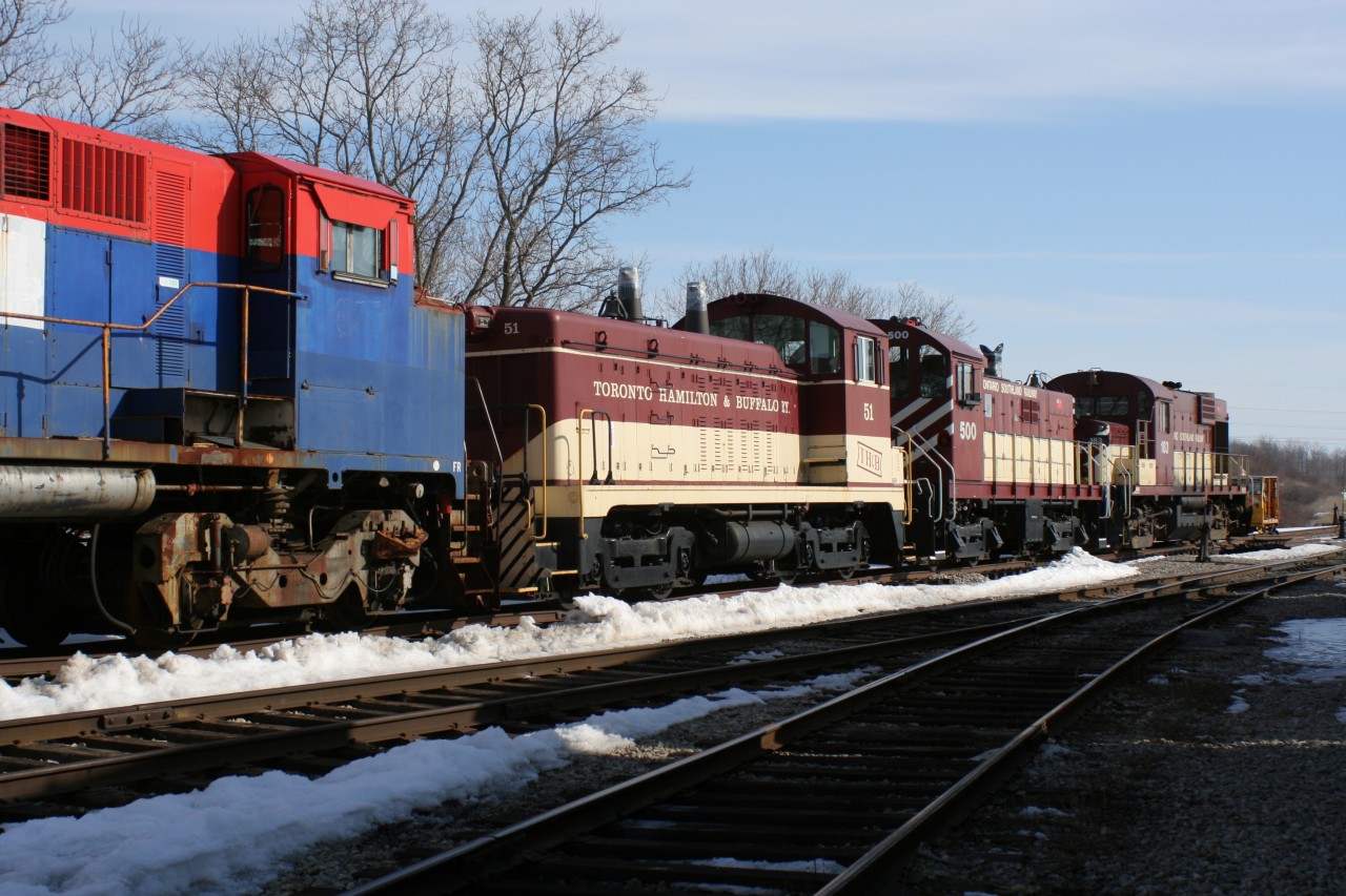 As winter is slowly giving way to spring, various Ontario Southland Railway motive power is seen gathered around the modern shop at Salford, Ontario.