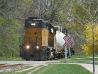 Goderich-Exeter Railway (GEXR) train X580 with LLPX GP38-2 2236 leads tank cars at it crosses Willow Street on the Waterloo Spur, as it approaches Uptown Waterloo on a pleasant spring morning. Train X580 is destined for Elmira where it will service the chemical facilities, before returning to Kitchener later in the morning.
