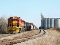 GEXR 580 has just cut off from their train to pick up a string of grain hoppers from the co-op in Shantz Station.
