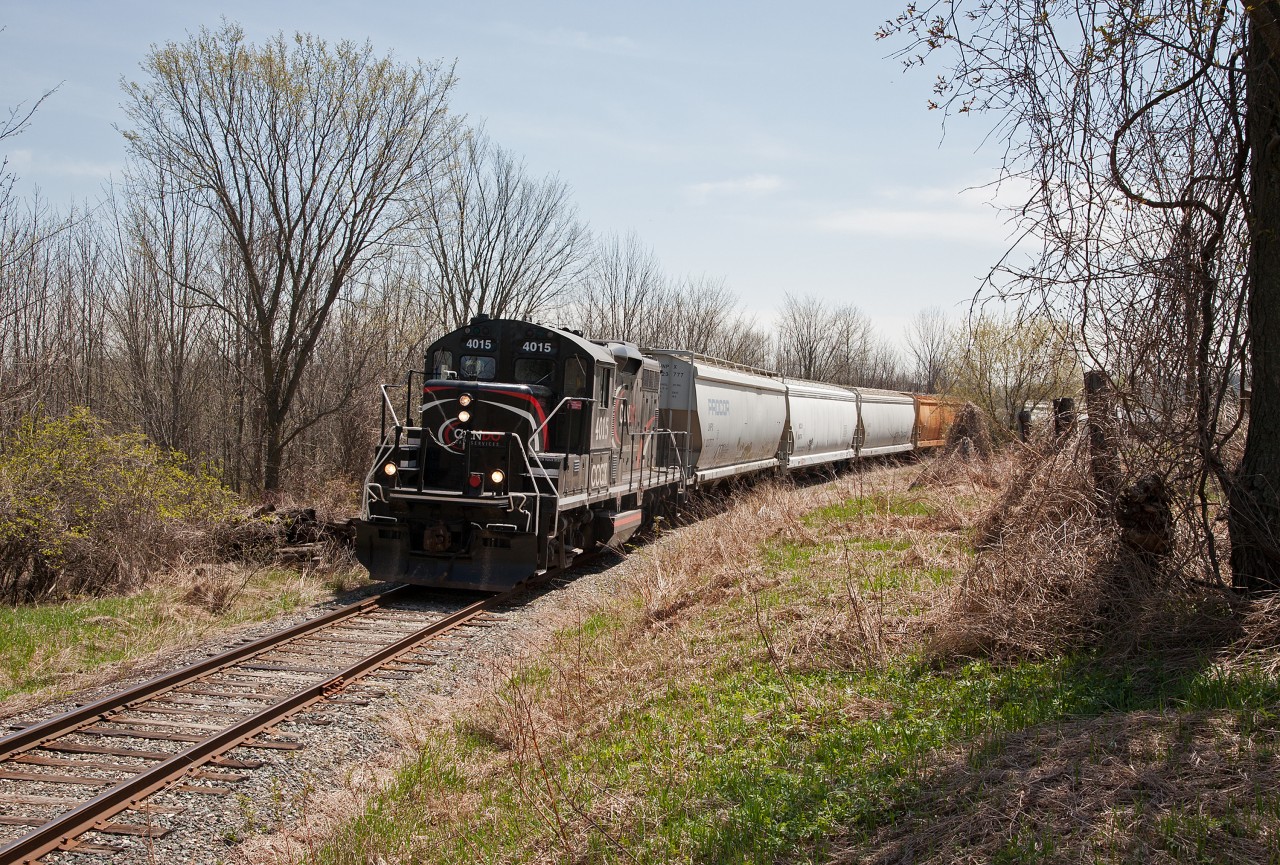 With spring finally in the air, the northbound Orangeville Wayfreight passes MP 21 on a rare Wednesday run.

CP's Streetsville Switcher was very late on Tuesday, so in true shortline fashion, Cando ran an extra to service the customers.

After 17 years, the Cando era will soon come to a close on this line.  Effective July 1, Trillium Rail will take over operation of the 35 mile line.
