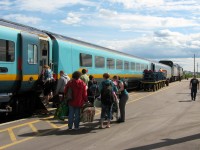MOMENT IN MONCTON. While travelling from Newfoundland to watch their son Thomas complete in the Atlantic Under 15 Soccer Championships in Fredericton, the second of three modes of travel was completed at Moncton on June 23, 2011. Having already flown to Halifax on an early morning Air Canada flight from St.John's, they boarded VIA Rails's westbound 'Ocean' to Moncton to enjoy an excellent meal in the Renaissance diner before transferring to an Orleans bus bound for Fredericton. Plenty of train activity in the late afternoon as second unit F40PH # 6431 is refuelled, the baggage car is loaded and a whole new group of passengers board for the overnight run to Montreal. Lead by F40PH 6408 in the 'Coors Light Silver Bullet Express' scheme on one of the longest days of the year, the 'Ocean' would arrive in Bathurst well before before darkness fell.