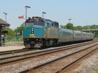 VIA Rail F40PH-3 6405 pauses at the Brockville, Ontario train station on a westbound train during a summer afternoon.
