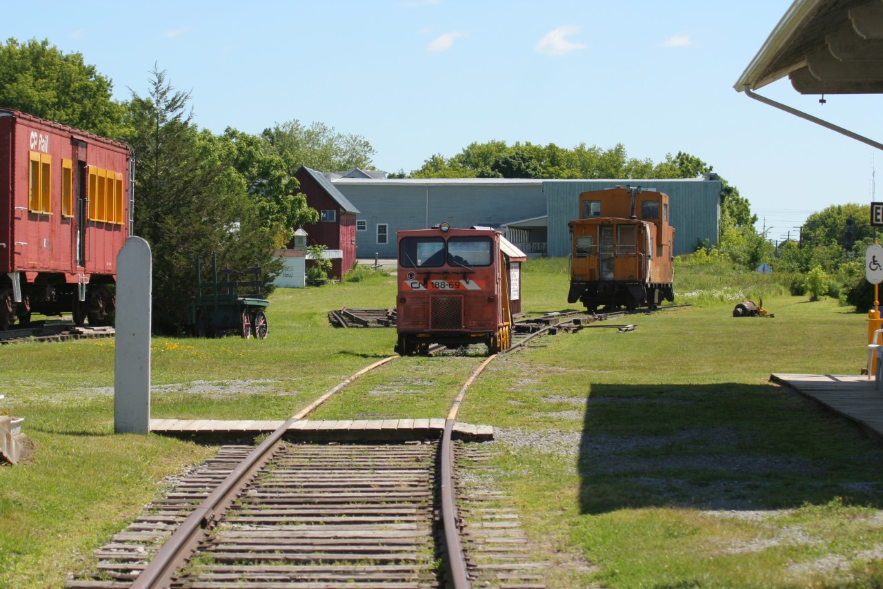 Various preserved railway equipment from both CN and Canadian Pacific is seen at the Memory Junction Railway Museum in Brighton, Ontario on a summer morning.