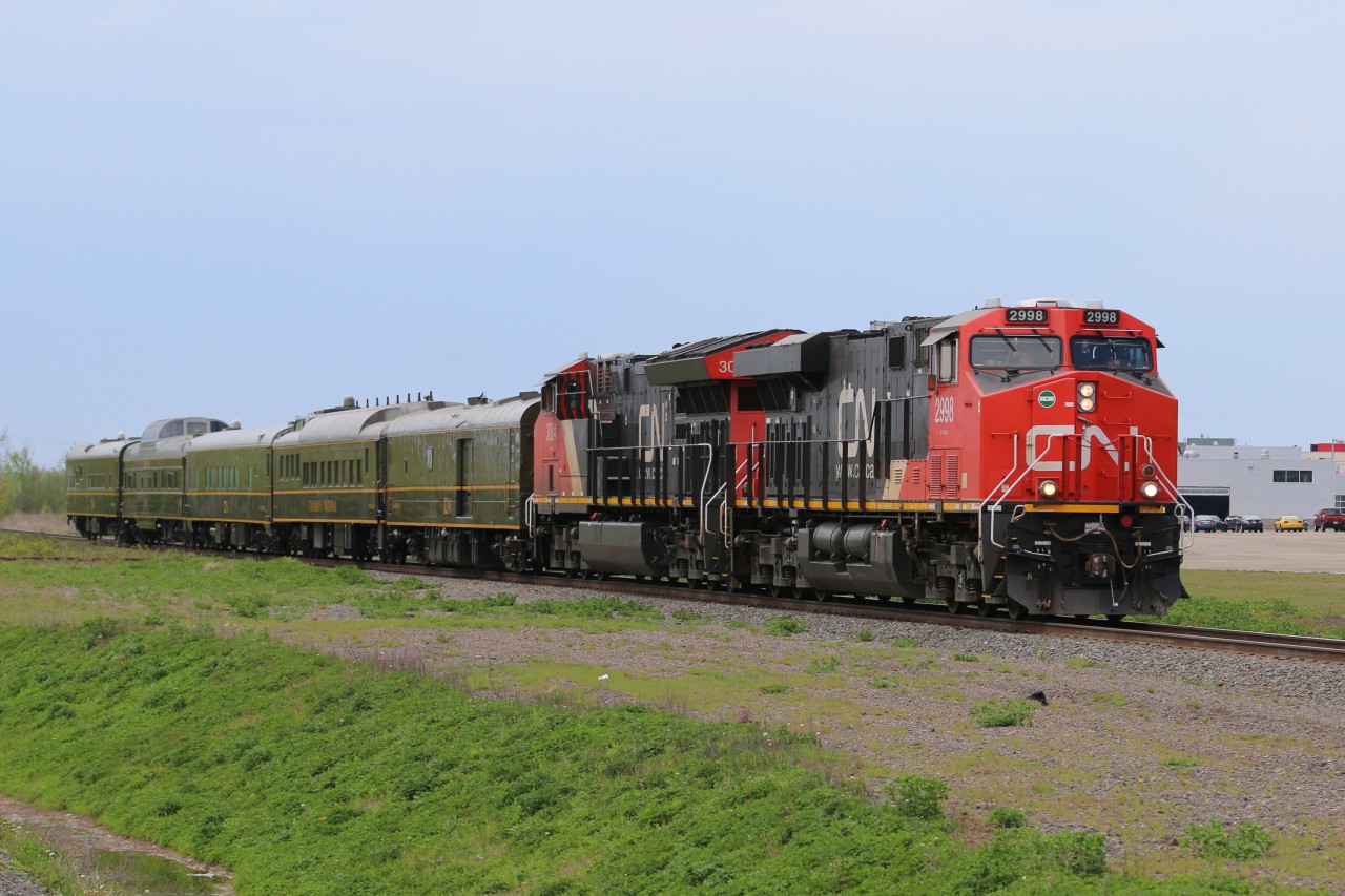 CNs business train approaches the Via station downtown Moncton with 2998 and 3084 leading the special train destined for Halifax, NS.