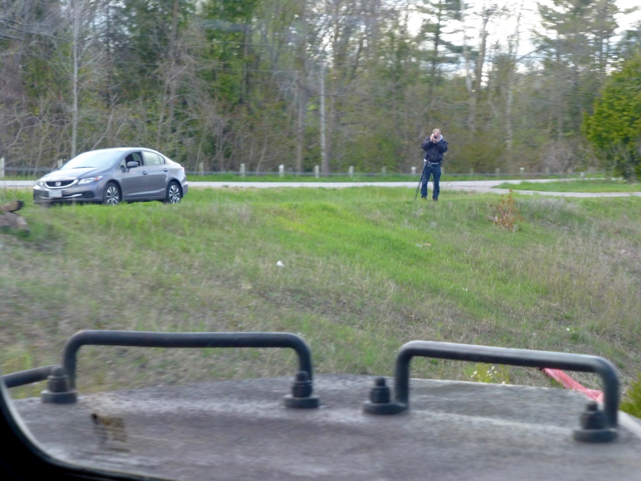 Turning the tables! An engineers view of all you "foamers" out there at Scotch Block.  LOL actually I decided to shoot this pic years ago when headed upgrade at mileage 30 on the Halton. Often a favorite spot for railfans. Now that I hung up my throttle (but not retired from railroading just yet) I will have to come out here with my camera and join you boys. 
Say cheese!! :-)