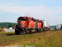 Anyone recall exactly when the Expressway trains to Detroit were cancelled and what their symbols were? We took these for granted, four per day , operating on schedule.. boring unit trains we thought. But thankfully I was able to photograph a few in good light on nice days.... because it would seem I basically ignored them most of the time instead seeking out Branchline action or manifests. While the economy of ours heats up the market for truckers is becoming very very tight - companies are now turning to rail to get product moved, and I wonder if the rail market is also tightening up and CP is instead looking to concentrate their resources on higher revenue shipments, my thoughts on why the Expressway is to be cancelled at the end of this month. Feel free to comment below and add to the discussion. 