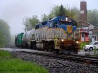 CP's Weed Spraying Train passes through quaint Campbellville, and somehow, I managed to cut all of the clutter in my final shot - all the crossing gates, everything. It was so dark that any photos including headlights blew the train to a silhouette, as the engines turned in the curve it looked far better (and I was shooting 1/400 in Manual mode) and my final shot here was the best. 80mm on my 80-400 f/5.6 lens. <a href=https://www.google.com/search?q=bill+thomson+campbellville+site:railpictures.ca target=_blank>Bill Thomson</a> shot here tonnes of times and I am reminded of his photos when shooting here! Thanks Bill for sharing them. I'm glad to continue in your footsteps.