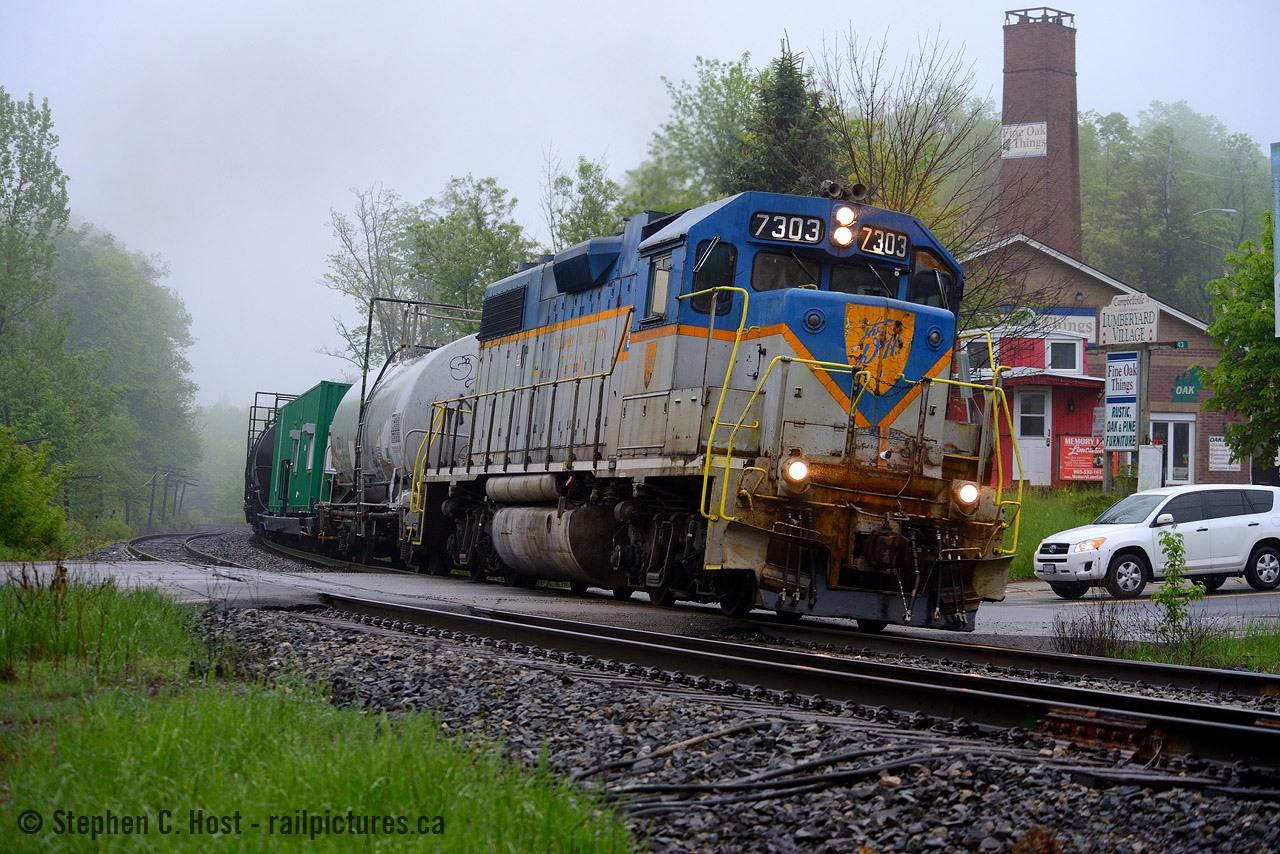 CP's Weed Spraying Train passes through quaint Campbellville, and somehow, I managed to cut all of the clutter in my final shot - all the crossing gates, everything. It was so dark that any photos including headlights blew the train to a silhouette, as the engines turned in the curve it looked far better (and I was shooting 1/400 in Manual mode) and my final shot here was the best. 80mm on my 80-400 f/5.6 lens. Bill Thomson shot here tonnes of times and I am reminded of his photos when shooting here! Thanks Bill for sharing them. I'm glad to continue in your footsteps.