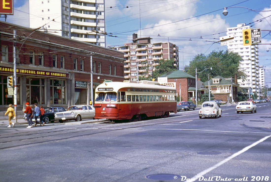 A group of kids out for an afternoon stroll cross Mount Pleasant Avenue in front of waiting traffic and TTC PCC streetcar 4506, which has just departed Eglinton Loop on the lengthy St. Clair route heading southbound. After going south on Mount Pleasant to St. Clair Ave., 4506 will then turn and head west across St. Clair, stop at the namesake subway station loop at Yonge Street, and continue on west again to Keele Loop in West Toronto. This was a few years before the eastern portion of the St. Clair route serving Mount Pleasant was split off into its own streetcar route (only to end in mid-1976). The A-8 class of PCC streetcars (4500-4549) were the TTC's final order for newly-built PCC's, purchased in 1951 and operated on routes out of St. Clair Carhouse (aka Wychwood) for much of their lives.

Today streetcars have been long gone from Mount Pleasant, and service is provided by TTC's route 74 bus (reaching all the way to the top of Mount Pleasant at Doncliffe Loop).

Stephen M. Scalzo photo, slide from the Dan Dell'Unto collection.