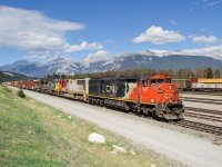 With a colourful lashup of power on the headend, X311's train pulls into Jasper for a crew change. CN C40-8M 2433, PRLX SD75M 200, GECX C40-8W 7344 and CN C40-8W 2176 provide the horsepower.