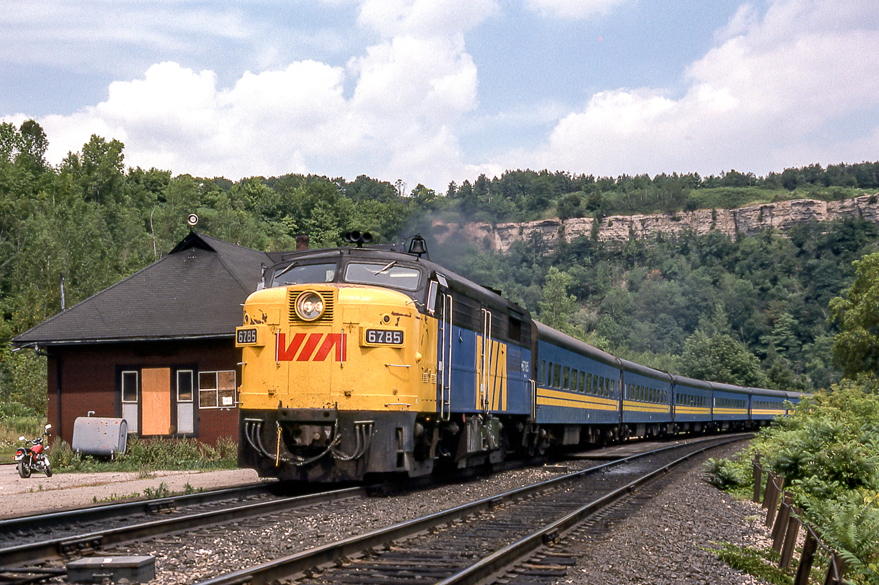 VIA 6785 is at the VIA station in Dundas, Ontario on August 15, 1982.