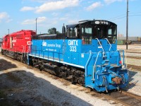 Cab end view of MP15AC GMTX 333 that will be going to operate the OBRY. Behind it is the St.Paul hump unit SD40-3 5102.