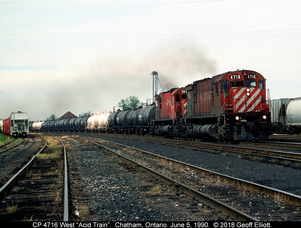 CP M636 #4716 leads M630 #4554 through the curve and the yard in Chatham, Ontario back on June 5, 1990.  Today the Big 'M's have an Acid train out of Sudbury in tow bound for interchange to one of either Conrail, NS, or Essex Terminal in Windsor, Ontario.