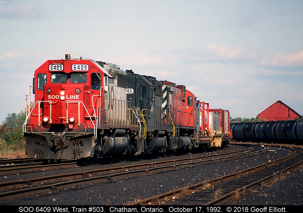 26 years ago CP train #503 rolls through Chatham Yard on October 17, 1992 with SOO Line SD40 #6409 at the helm.  Trailing is former Norfolk Southern Hi-Hood SD40-2 #3245, while a "Big M" brings up the rear.  Never a dull moment on the Windsor Sub back in the day.