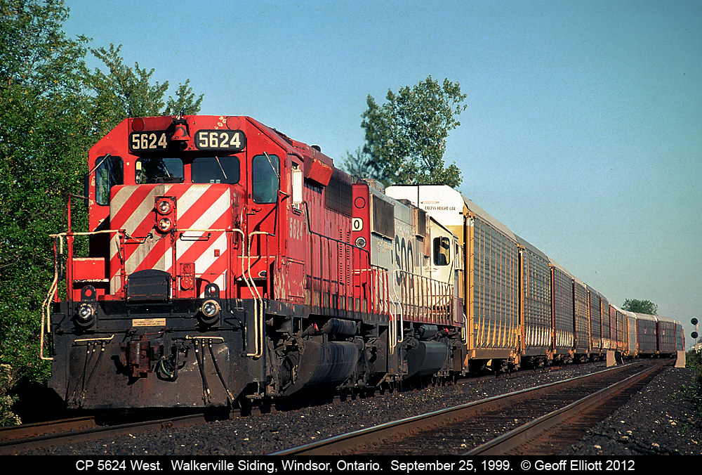CP SD40-2 #5624 leads a SOO Line SD60 into the Walkerville siding on the CP Windsor Subdivision.  The signal in the distance governs all eastbound movements as Begin/End CTC Walkerville.