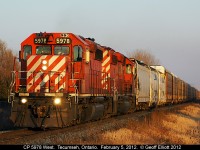 A pair CP SD40-2's, with 5978 on point, lead a westbound mixed into the low light of the setting sun while passing through Tecumseh, Ontario back on February 5, 2012.