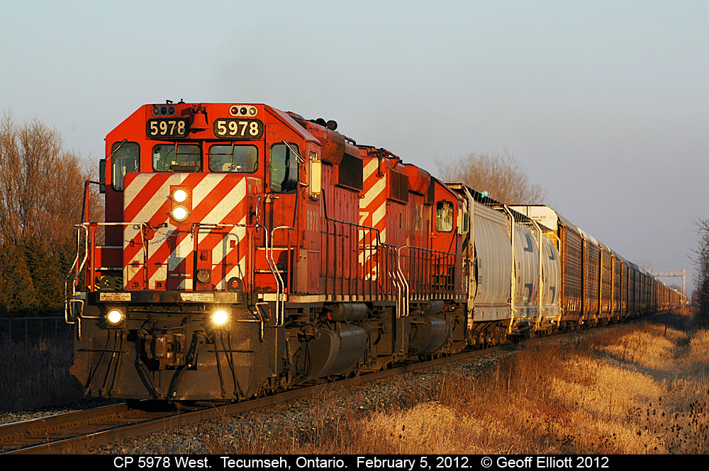 A pair CP SD40-2's, with 5978 on point, lead a westbound mixed into the low light of the setting sun while passing through Tecumseh, Ontario back on February 5, 2012.