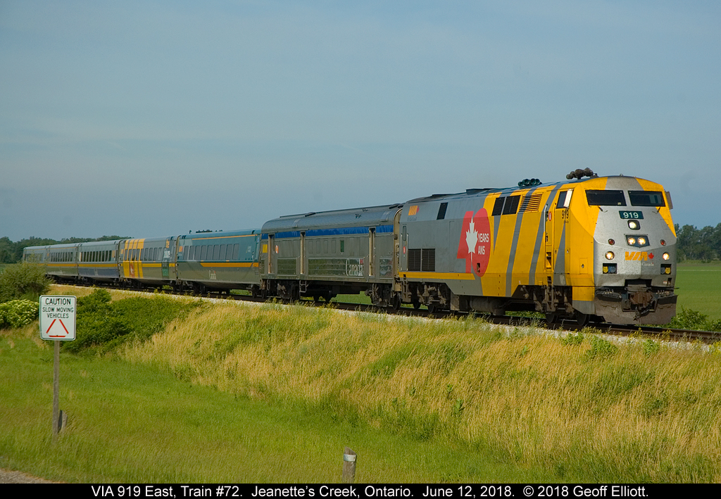 No slow moving vehicles in this picture.  VIA 919, running full track speed, flies through the country side of Kent County while on it's trip from Windsor to Toronto.