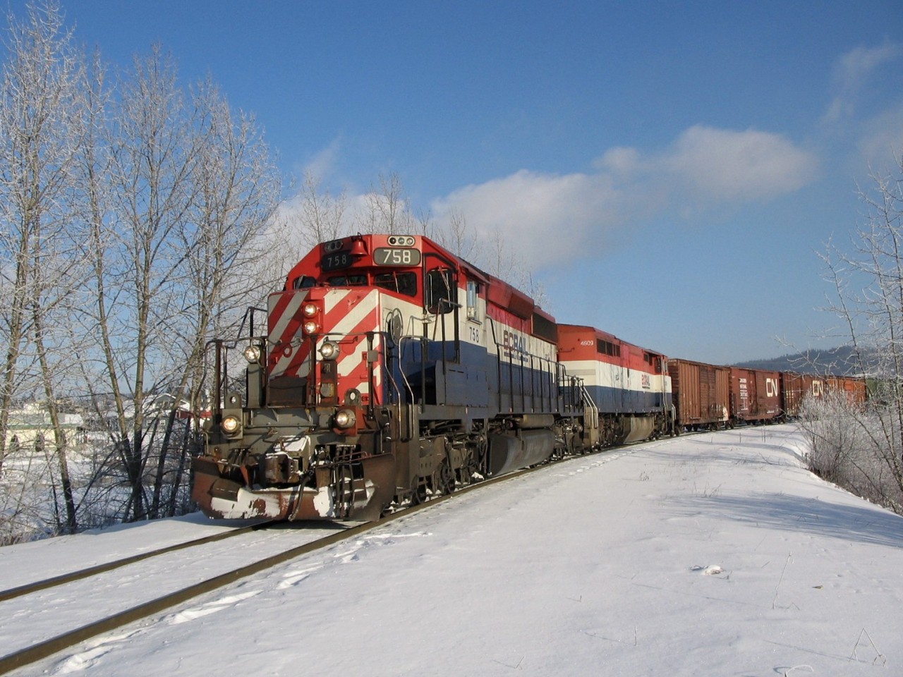 Nice sunny day and a great day for a train ride. Stopped at Quesnel to do some set out and a pickup, pumping air and time for a photo or two. It was bitterly cold that morning and wished we had the second unit 4609 leading instead of the 758.