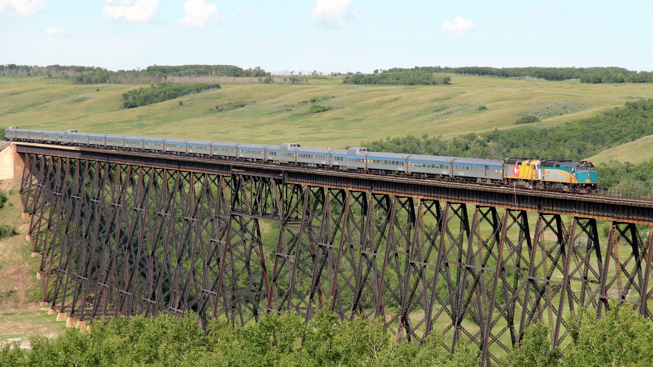 A late running VIA #2 Crosses the Battle River Trestle at Fabyan headed by 6426 and 40th Anniversary wrapped 6454